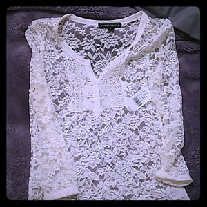 Almost famous, long see through shirt.